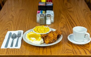 Fried chicken, mashed potatoes and gravy, and corn at Tiffany's Restaurant in Topeka, Indiana.