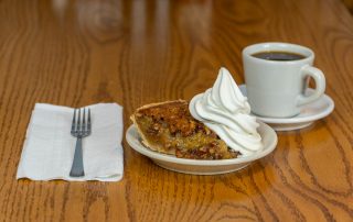 Pecan pie with soft-serve ice cream and a cup of coffee at Tiffany's Restaurant in Topeka, Indiana